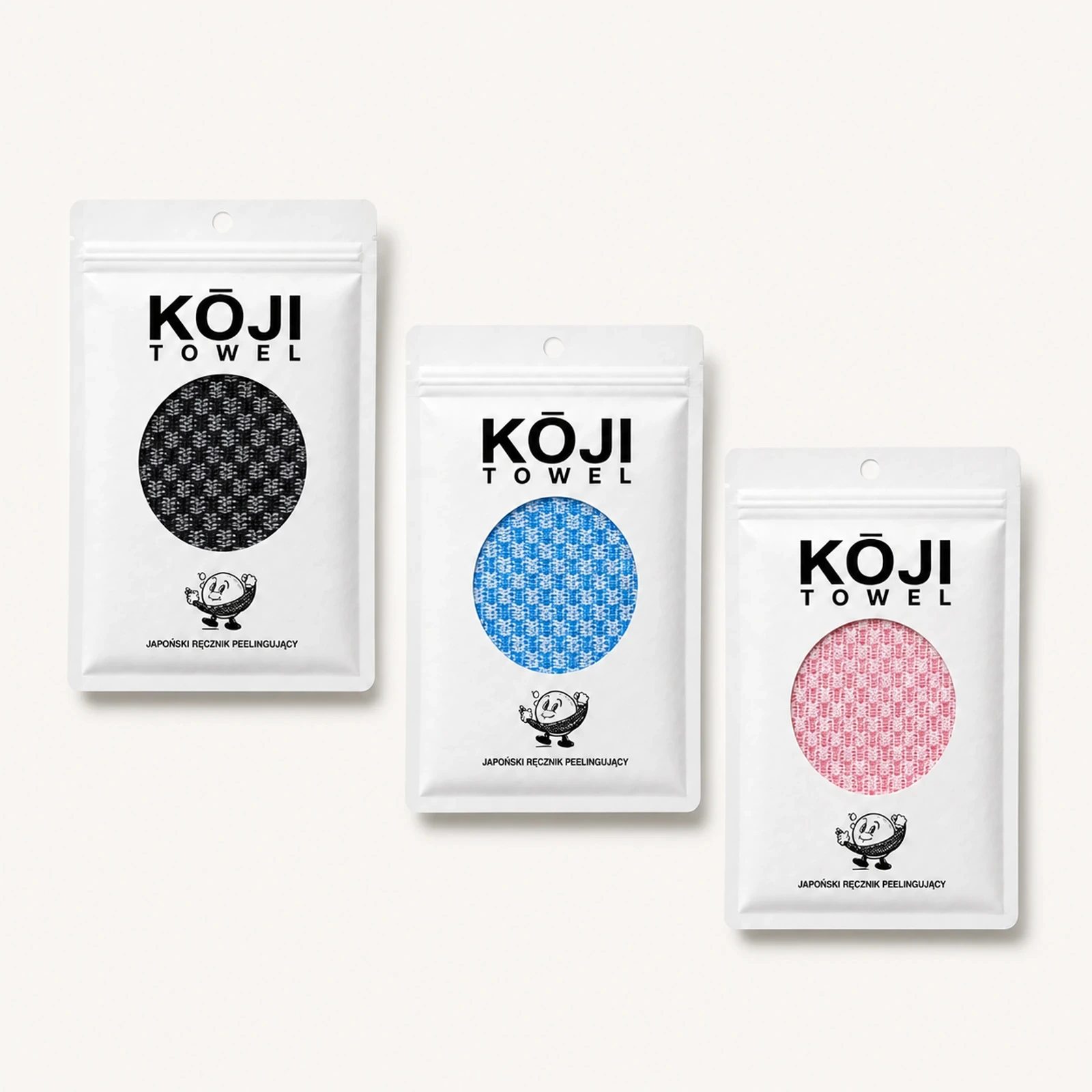 Opakowania Kōji Towel w kolorach czarnym, niebieskim i różowym